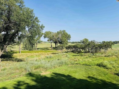 Privately set on a quiet drive, this Colorado-style home offers on Prairie Dunes Country Club in Kansas - for sale on GolfHomes.com, golf home, golf lot