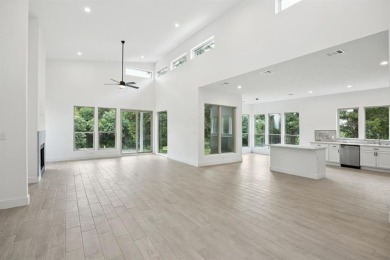 Stunning modern retreat atop a heavily treed .47-acre lot on Keeton Park Golf Course in Texas - for sale on GolfHomes.com, golf home, golf lot