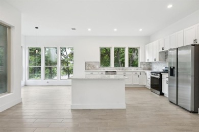 Stunning modern retreat atop a heavily treed .47-acre lot on Keeton Park Golf Course in Texas - for sale on GolfHomes.com, golf home, golf lot