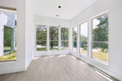 Stunning modern retreat atop a heavily treed .47-acre lot on Keeton Park Golf Course in Texas - for sale on GolfHomes.com, golf home, golf lot