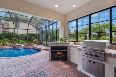 This gorgeous custom Lee Wetherington home is poised on one of on Lakewood Ranch Golf and Country Club in Florida - for sale on GolfHomes.com, golf home, golf lot