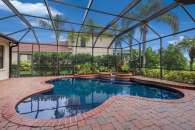 This gorgeous custom Lee Wetherington home is poised on one of on Lakewood Ranch Golf and Country Club in Florida - for sale on GolfHomes.com, golf home, golf lot