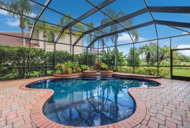 This gorgeous custom Lee Wetherington home is poised on one of on Lakewood Ranch Golf and Country Club in Florida - for sale on GolfHomes.com, golf home, golf lot