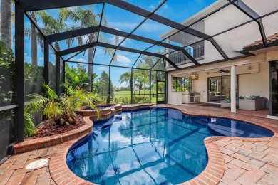 This gorgeous custom Lee Wetherington home is poised on one of on Lakewood Ranch Golf and Country Club in Florida - for sale on GolfHomes.com, golf home, golf lot