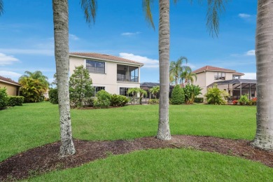 This gorgeous custom Lee Wetherington home is poised on one of on Lakewood Ranch Golf and Country Club in Florida - for sale on GolfHomes.com, golf home, golf lot