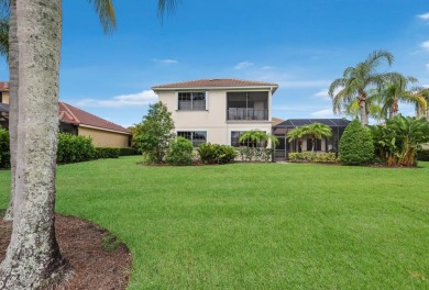 This gorgeous custom Lee Wetherington home is poised on one of on Lakewood Ranch Golf and Country Club in Florida - for sale on GolfHomes.com, golf home, golf lot