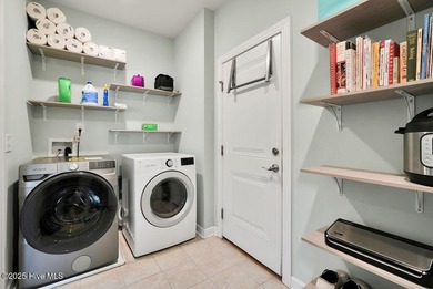 Welcome to this breathtaking 5-bedroom retreat, perfectly on Beau Rivage Golf and Resort in North Carolina - for sale on GolfHomes.com, golf home, golf lot