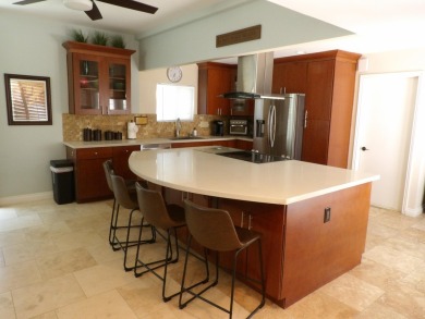Meet your new poolside desert retreat! This 1,400 sf condo has on Cathedral Canyon Golf and Tennis Club in California - for sale on GolfHomes.com, golf home, golf lot