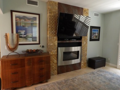 Meet your new poolside desert retreat! This 1,400 sf condo has on Cathedral Canyon Golf and Tennis Club in California - for sale on GolfHomes.com, golf home, golf lot