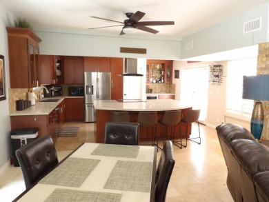 Meet your new poolside desert retreat! This 1,400 sf condo has on Cathedral Canyon Golf and Tennis Club in California - for sale on GolfHomes.com, golf home, golf lot