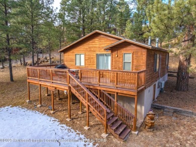 Located in the heart of Ruidoso, this 2-bedroom, 2-bath cabin is on Cree Meadows Country Club in New Mexico - for sale on GolfHomes.com, golf home, golf lot