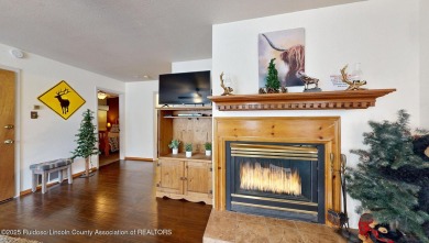 Located in the heart of Ruidoso, this 2-bedroom, 2-bath cabin is on Cree Meadows Country Club in New Mexico - for sale on GolfHomes.com, golf home, golf lot