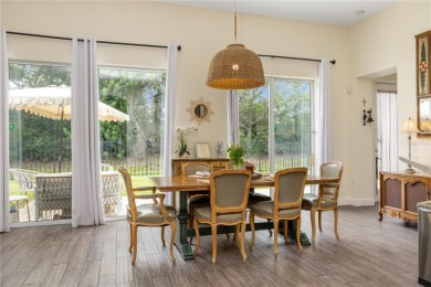 Tucked away at the end of a serene cul-de-sac in the prestigious on University Park Country Club in Florida - for sale on GolfHomes.com, golf home, golf lot