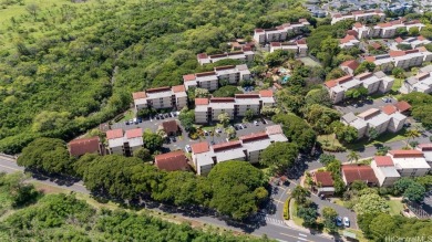 Discover the perfect blend of comfort and tranquility in this on Makaha Valley Country Club in Hawaii - for sale on GolfHomes.com, golf home, golf lot