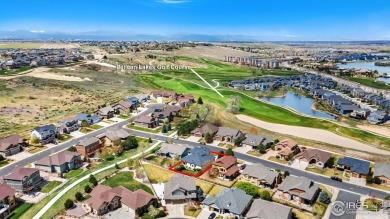 This two-story gem is a total showstopper! Located in the on Pelican Lakes Golf and Country Club in Colorado - for sale on GolfHomes.com, golf home, golf lot