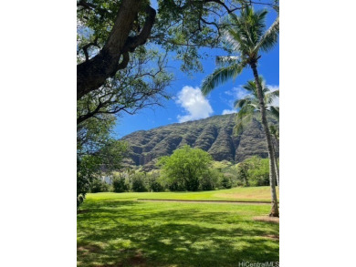 Discover the perfect blend of comfort and tranquility in this on Makaha Valley Country Club in Hawaii - for sale on GolfHomes.com, golf home, golf lot