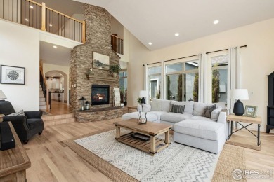 This two-story gem is a total showstopper! Located in the on Pelican Lakes Golf and Country Club in Colorado - for sale on GolfHomes.com, golf home, golf lot