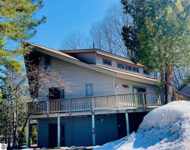 Stylish & spacious contemporary home overlooking popular Summit on Shanty Creek Golf Course in Michigan - for sale on GolfHomes.com, golf home, golf lot
