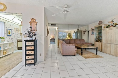 Welcome inside a vibrant first-floor unit located in the on Kings Point Golf -Flanders Way in Florida - for sale on GolfHomes.com, golf home, golf lot