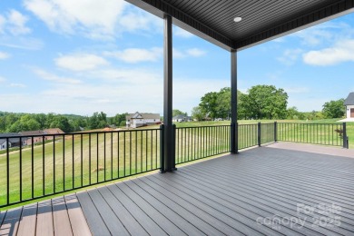 Welcome to this spacious new construction home on 0.51 acres in on Rock Barn Golf and Spa in North Carolina - for sale on GolfHomes.com, golf home, golf lot