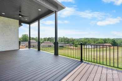 Welcome to this spacious new construction home on 0.51 acres in on Rock Barn Golf and Spa in North Carolina - for sale on GolfHomes.com, golf home, golf lot