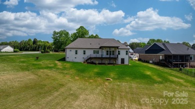 Welcome to this spacious new construction home on 0.51 acres in on Rock Barn Golf and Spa in North Carolina - for sale on GolfHomes.com, golf home, golf lot