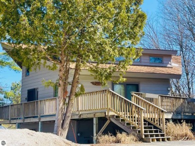 Stylish & spacious contemporary home overlooking popular Summit on Shanty Creek Golf Course in Michigan - for sale on GolfHomes.com, golf home, golf lot