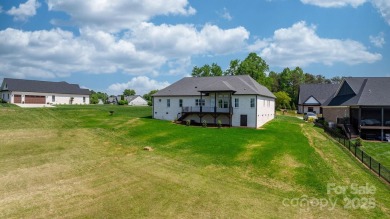 Welcome to this spacious new construction home on 0.51 acres in on Rock Barn Golf and Spa in North Carolina - for sale on GolfHomes.com, golf home, golf lot