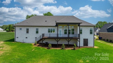 Welcome to this spacious new construction home on 0.51 acres in on Rock Barn Golf and Spa in North Carolina - for sale on GolfHomes.com, golf home, golf lot