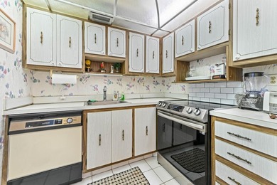 Welcome inside a vibrant first-floor unit located in the on Kings Point Golf -Flanders Way in Florida - for sale on GolfHomes.com, golf home, golf lot