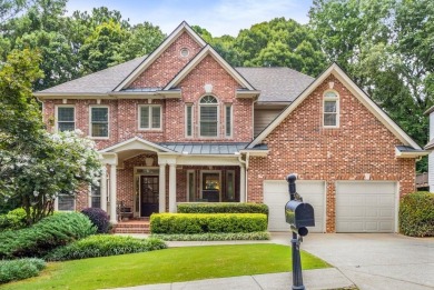 Come home to this beautifully maintained three-sided brick on The Golf Club of Georgia in Georgia - for sale on GolfHomes.com, golf home, golf lot