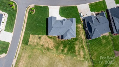 Welcome to this spacious new construction home on 0.51 acres in on Rock Barn Golf and Spa in North Carolina - for sale on GolfHomes.com, golf home, golf lot