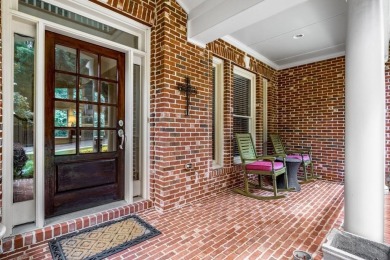 Come home to this beautifully maintained three-sided brick on The Golf Club of Georgia in Georgia - for sale on GolfHomes.com, golf home, golf lot