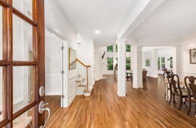 Come home to this beautifully maintained three-sided brick on The Golf Club of Georgia in Georgia - for sale on GolfHomes.com, golf home, golf lot