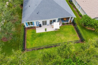 Tucked away at the end of a serene cul-de-sac in the prestigious on University Park Country Club in Florida - for sale on GolfHomes.com, golf home, golf lot