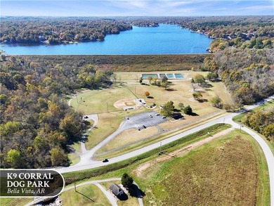 A peaceful, wooded lot in Bella Vista with a natural slope and a on Branchwood Golf Course in Arkansas - for sale on GolfHomes.com, golf home, golf lot