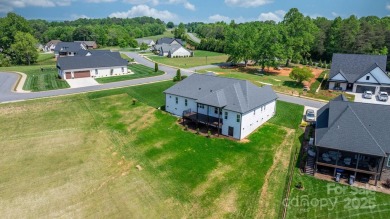 Welcome to this spacious new construction home on 0.51 acres in on Rock Barn Golf and Spa in North Carolina - for sale on GolfHomes.com, golf home, golf lot