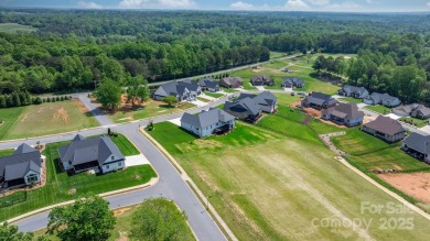 Welcome to this spacious new construction home on 0.51 acres in on Rock Barn Golf and Spa in North Carolina - for sale on GolfHomes.com, golf home, golf lot