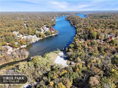 A peaceful, wooded lot in Bella Vista with a natural slope and a on Branchwood Golf Course in Arkansas - for sale on GolfHomes.com, golf home, golf lot
