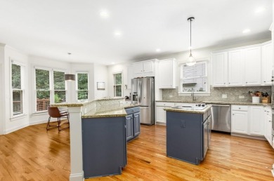 Come home to this beautifully maintained three-sided brick on The Golf Club of Georgia in Georgia - for sale on GolfHomes.com, golf home, golf lot