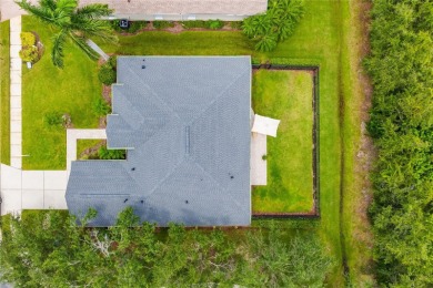 Tucked away at the end of a serene cul-de-sac in the prestigious on University Park Country Club in Florida - for sale on GolfHomes.com, golf home, golf lot