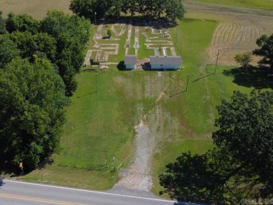 Unique Commercial Property in Batesville City Limits near Eagle on The Course At Eagle Mountain in Arkansas - for sale on GolfHomes.com, golf home, golf lot