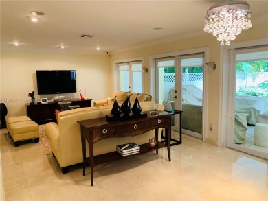 Beautifully updated Doral Dunes single family home on a larger on Jim McLean Signature Course in Florida - for sale on GolfHomes.com, golf home, golf lot