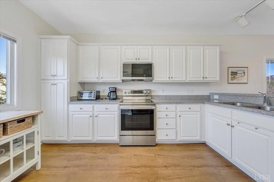 Enjoy easy lakefront living in this beautifully updated, 2-bed on Mariners Landing Golf and Country Club in Virginia - for sale on GolfHomes.com, golf home, golf lot