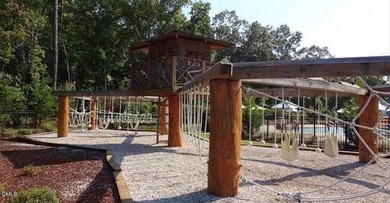 Incredible Opportunity To Own A Luxurious Home By Raleigh Custom on Hasentree Club in North Carolina - for sale on GolfHomes.com, golf home, golf lot