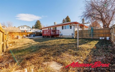 Located on a corner lot just blocks from the golf course on Olive Glenn Golf and Country Club in Wyoming - for sale on GolfHomes.com, golf home, golf lot