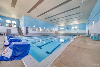 Enjoy easy lakefront living in this beautifully updated, 2-bed on Mariners Landing Golf and Country Club in Virginia - for sale on GolfHomes.com, golf home, golf lot