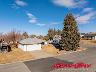 Located on a corner lot just blocks from the golf course on Olive Glenn Golf and Country Club in Wyoming - for sale on GolfHomes.com, golf home, golf lot