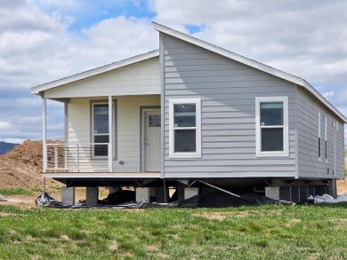Step into modern rural luxury with this stunning newly installed on Hollydot Golf Course in Colorado - for sale on GolfHomes.com, golf home, golf lot