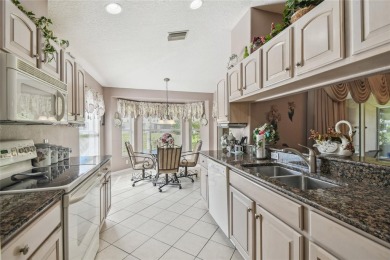 MOVE IN READY - PREMIER LOCATION - END UNIT - FURNISHED on Heritage Pines Country Club in Florida - for sale on GolfHomes.com, golf home, golf lot